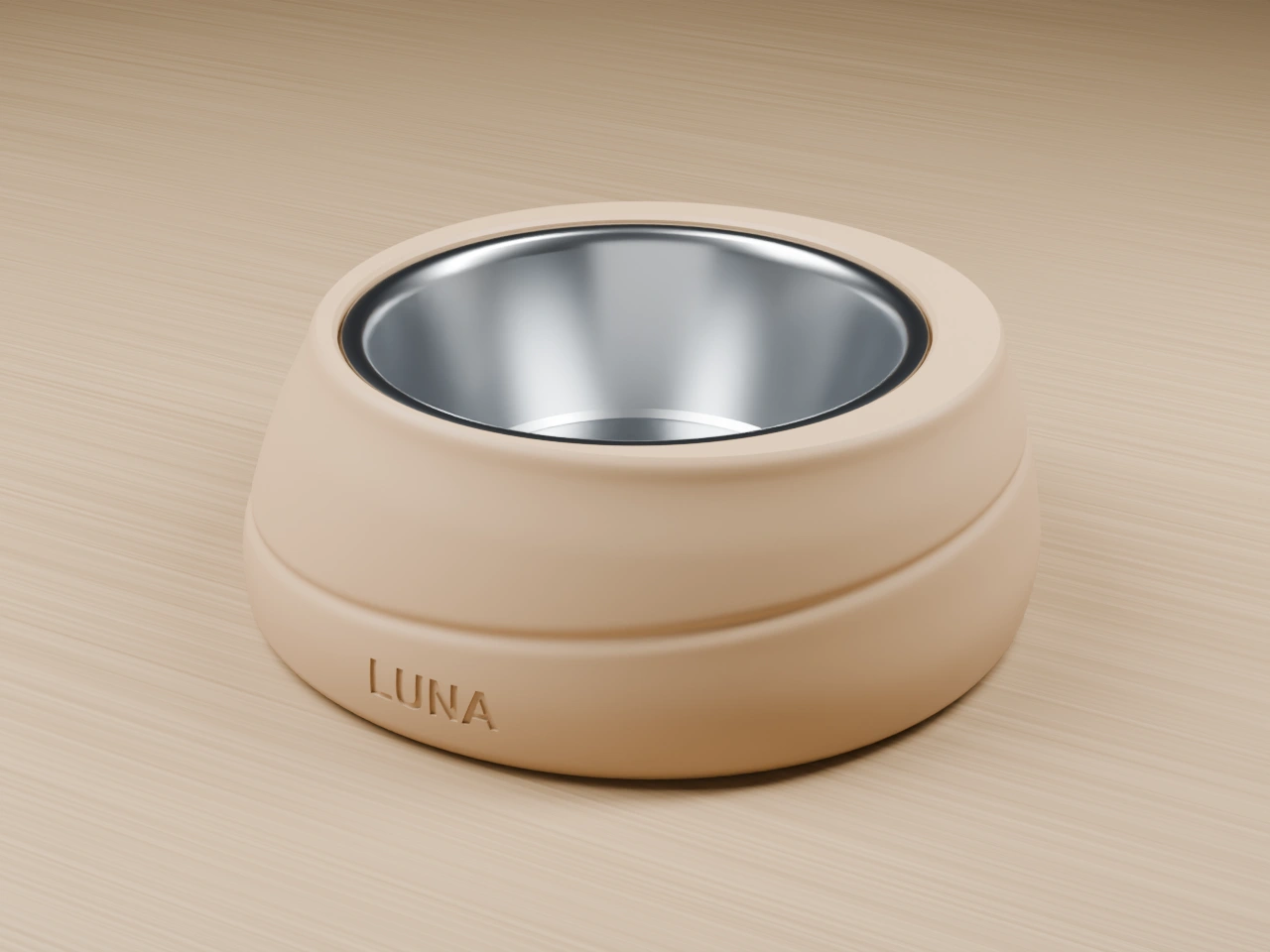 Orbit Single Bowl in Warm Sand with removable stainless bowl, on an oak floor